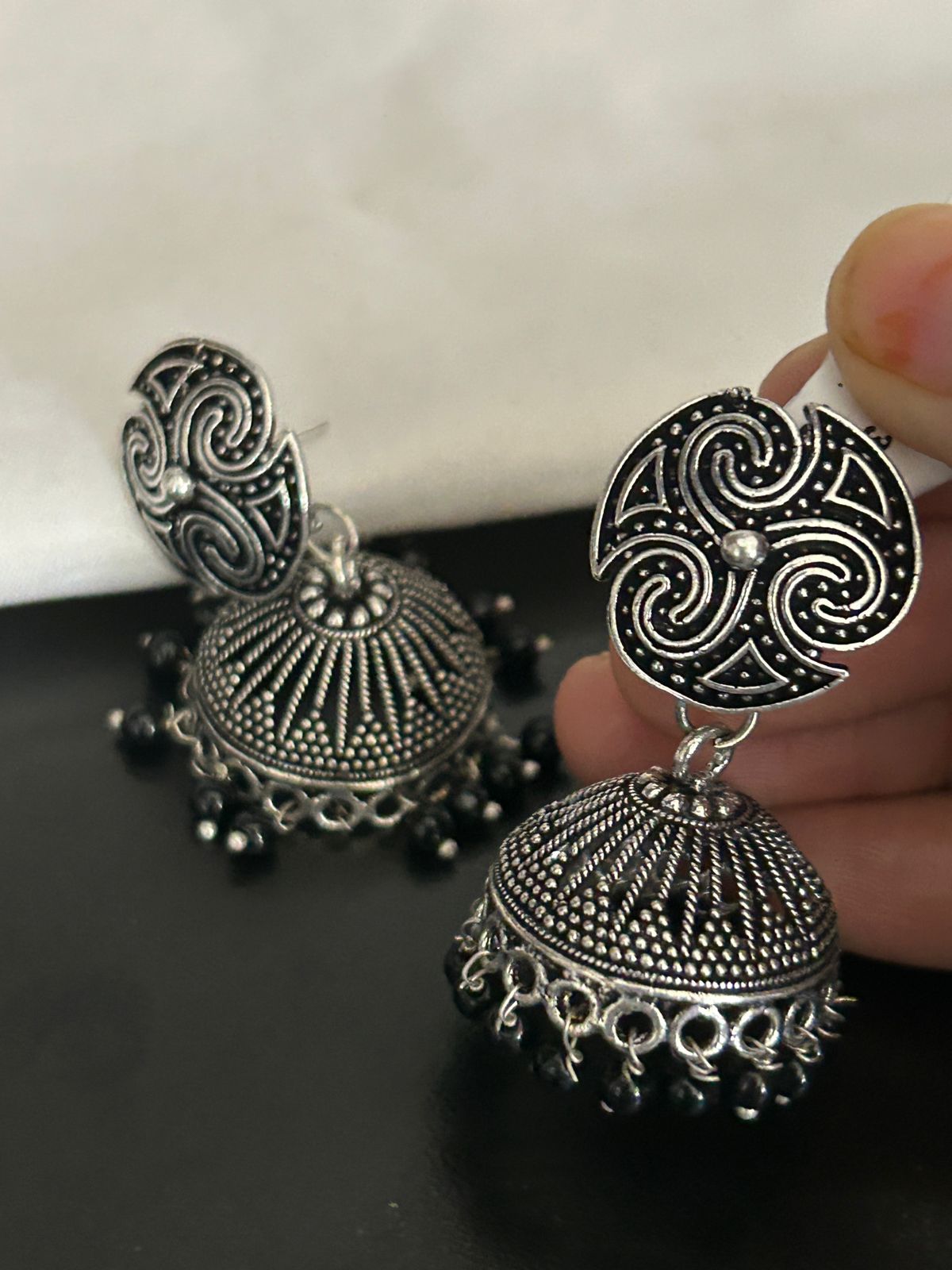Oxidized Silver Dome Jhumka Earrings with Tribal Design